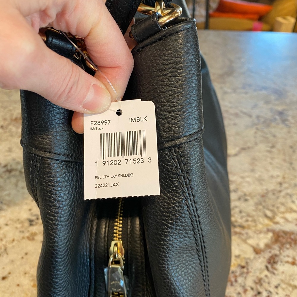Black leather Coach purse